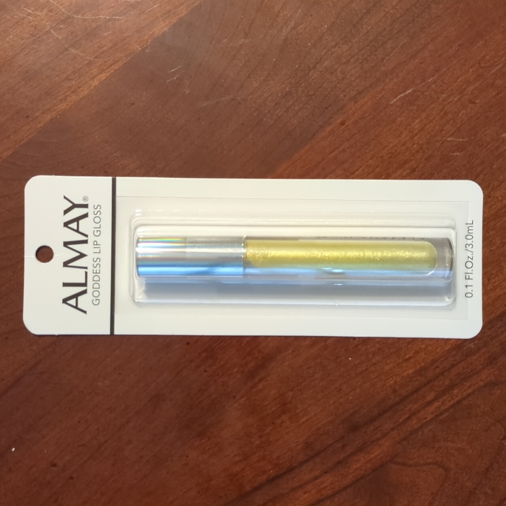 Almay goddess high shine lip gloss in gold